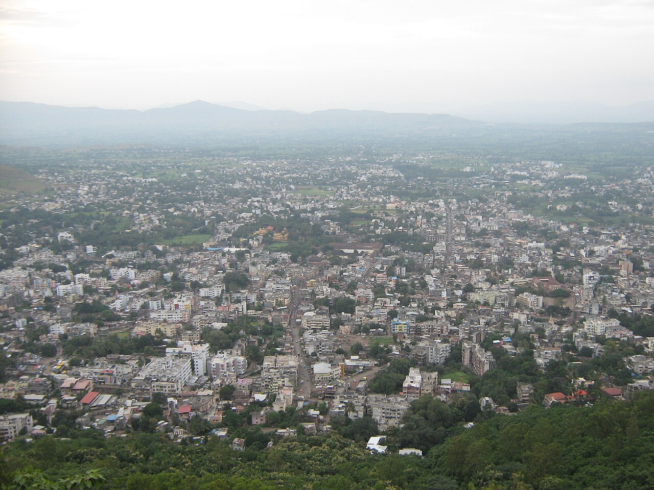 Aerial view of Satara city with hills in the background